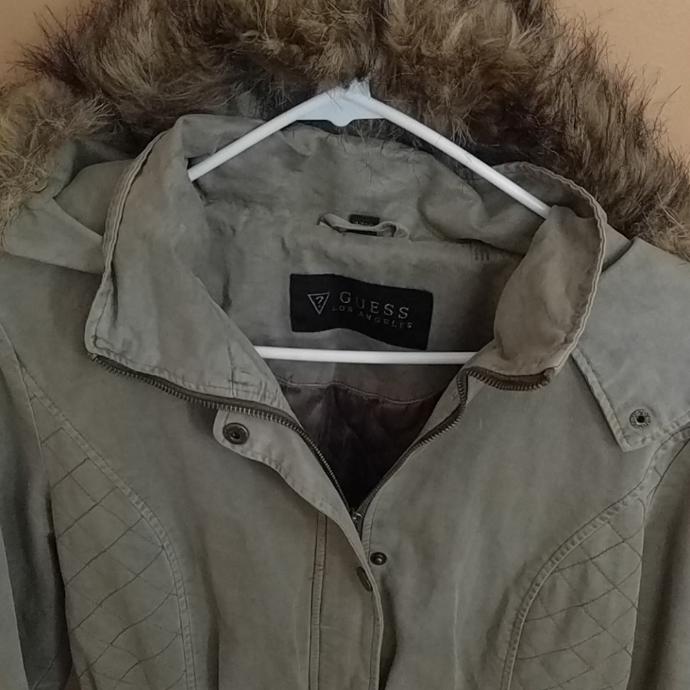 Guess jacket left pocket ripped